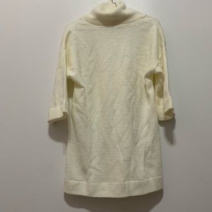 Cream coloured wool turtle neck